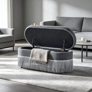 Oval Upholstered Storage Ottoman with Fringe Trim