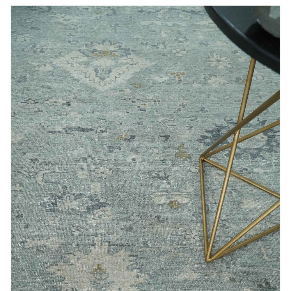 Distressed finished 8x10 Gray and Silver Low Pile wool Rug