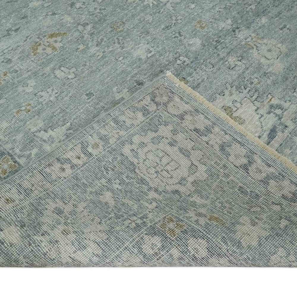 Distressed finished 8x10 Gray and Silver Low Pile wool Rug
