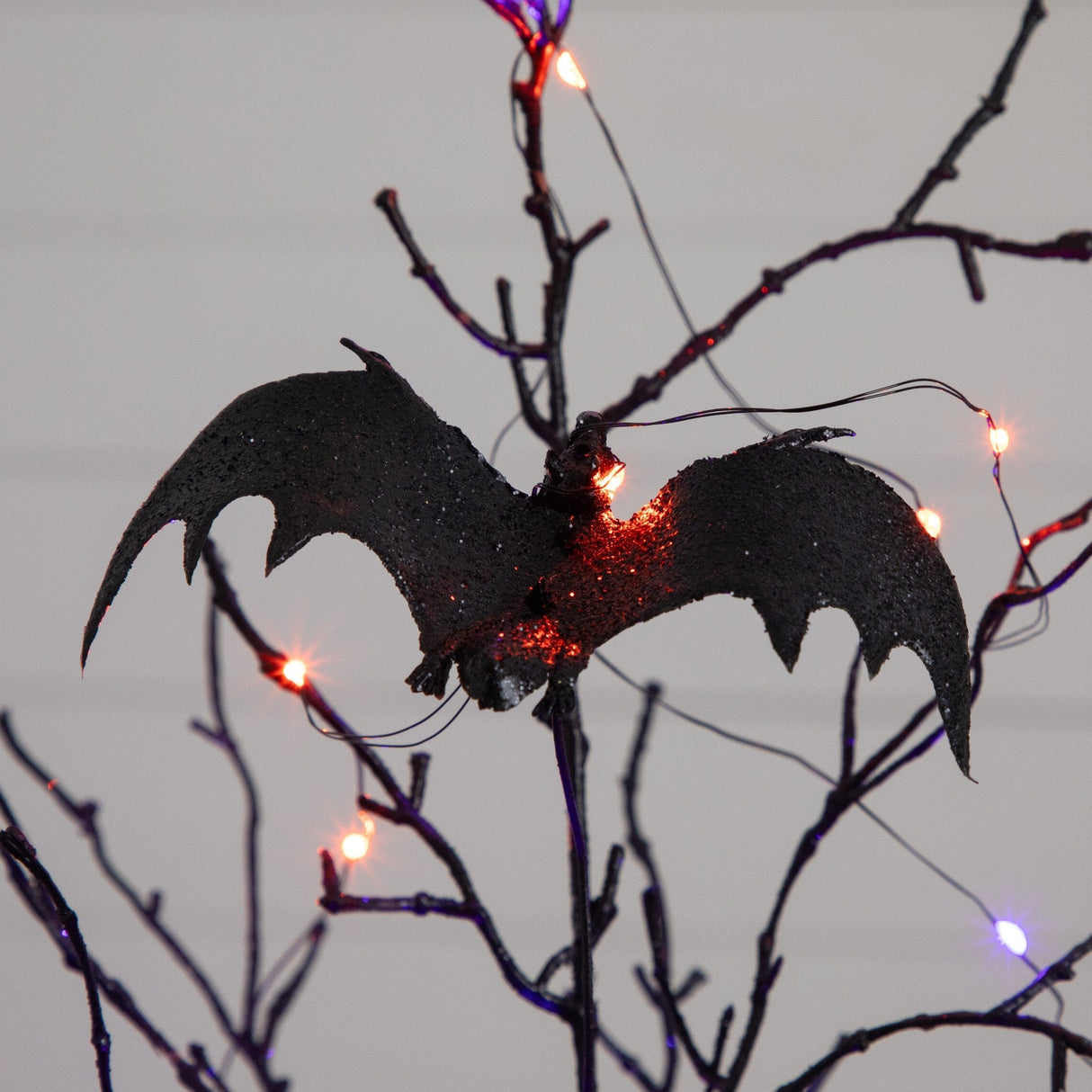 2' Pre-Lit Artificial Black Spooky Twig Tree with Bats and 40 Orange & Purple LED Lights