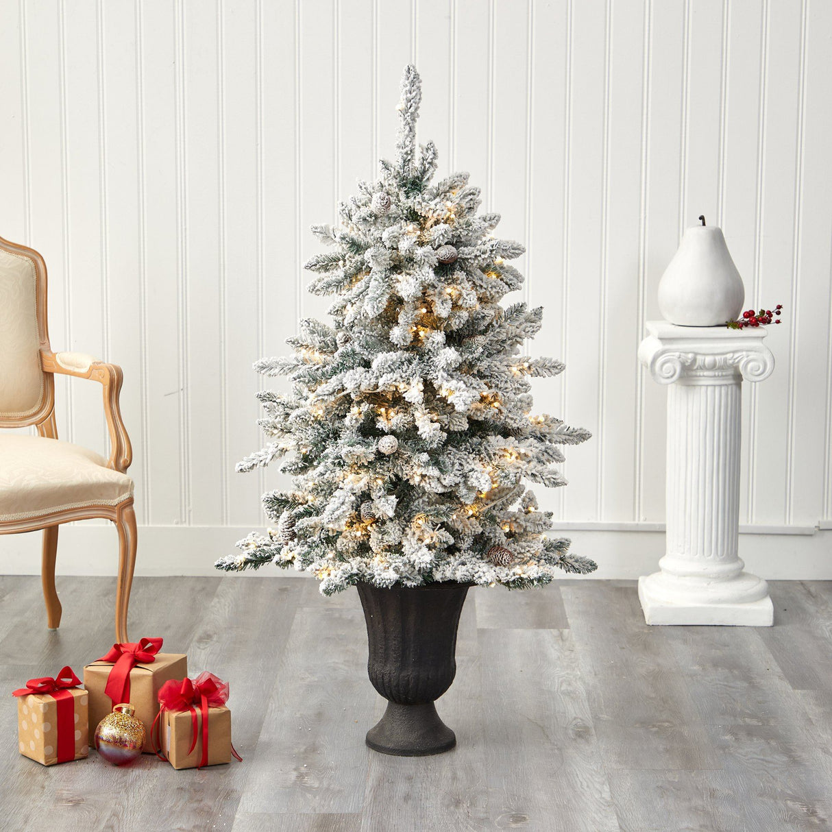 4.5’ Flocked Livingston Fir Artificial Christmas Tree with Pine Cones and 150 Clear Warm LED Lights in Charcoal Urn