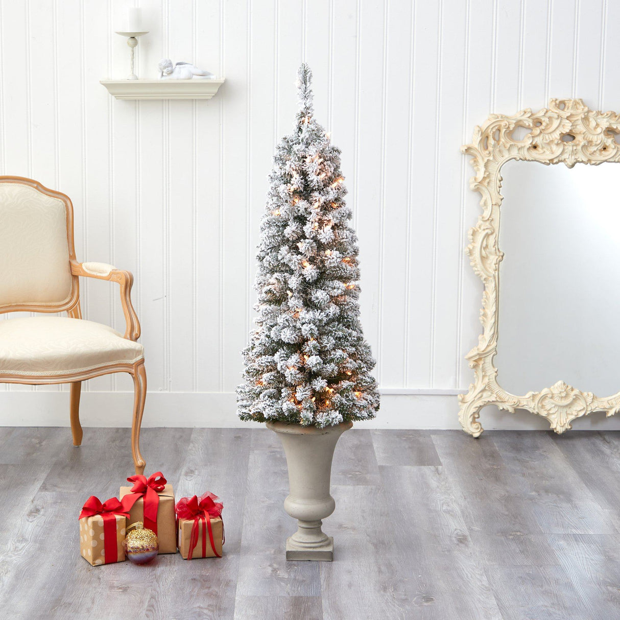 4.5’ Flocked Pencil Artificial Christmas Tree with 100 Clear Lights and 216 Bendable Branches in Sand Colored Urn