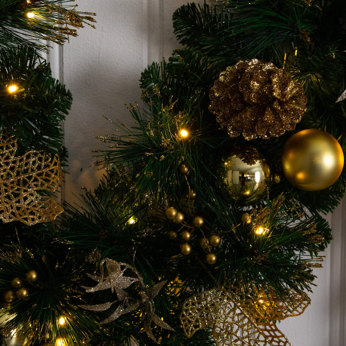9' Pre-Lit Artificial Golden Frosted Christmas Garland with 50 Warm White LED Lights Pinecones, Berries and Ornaments