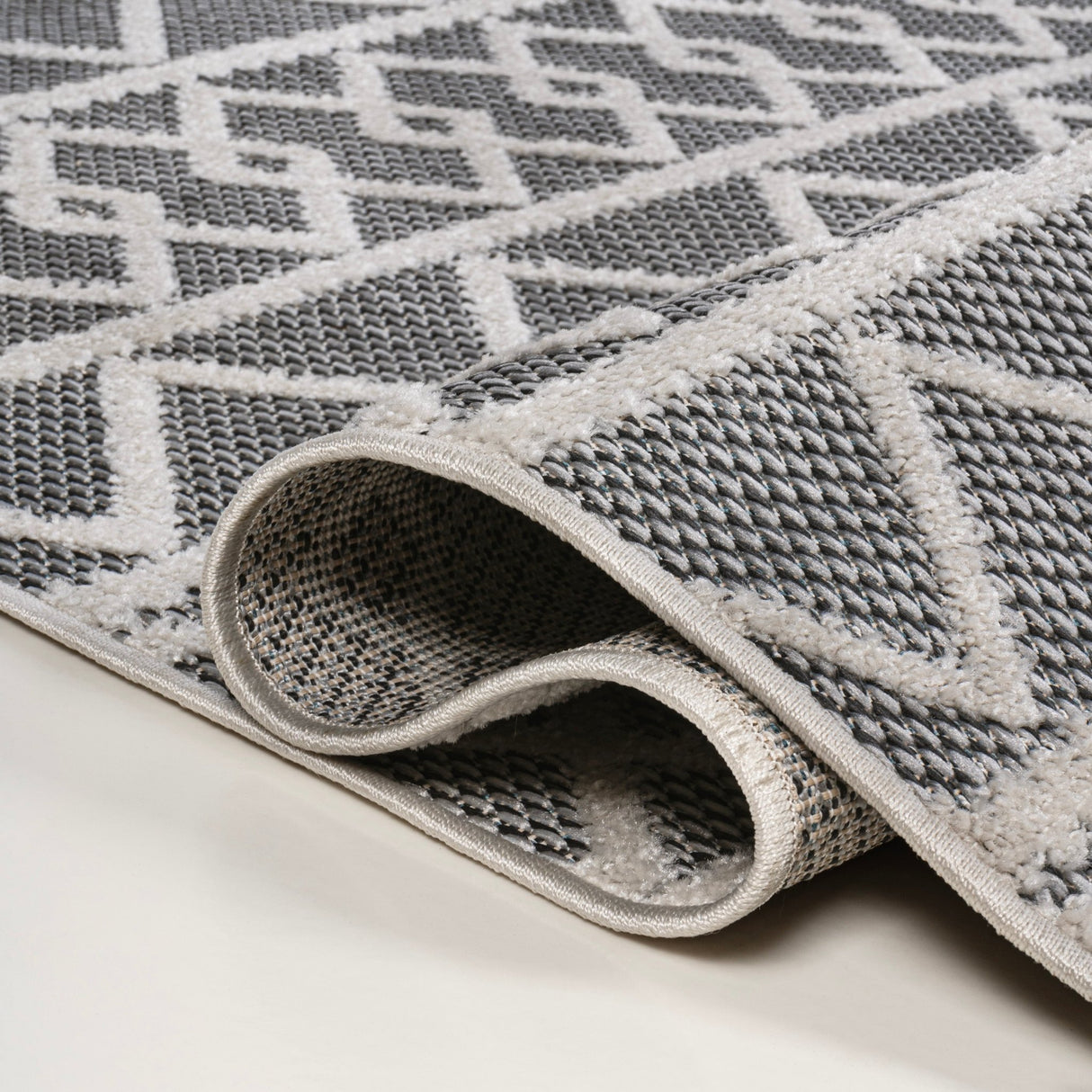 Aylan high - low pile knotted trellis geometric indoor/outdoor area rug - Tuesday Morning - Outdoor Rugs