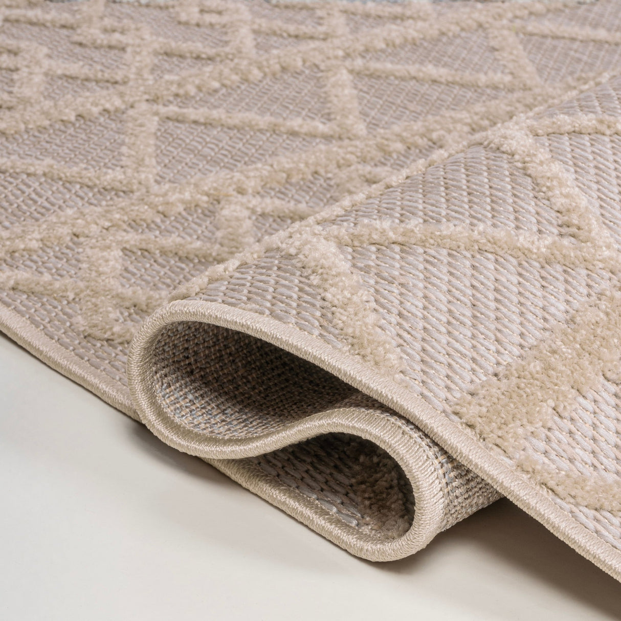 Aylan high - low pile knotted trellis geometric indoor/outdoor area rug - Tuesday Morning - Outdoor Rugs