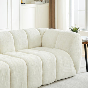 Quilted Cloud Sofa With Rounded Armrests And Piano Key Backrest Design
