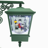 74-In. Musical Christmas Dual-Lantern Street Lamp with Santa, Snowman, 1 Sign, and Cascading Snow, Green