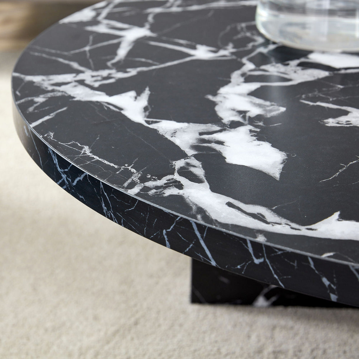 Versatile Round Coffee Table For Various Interior Styles
