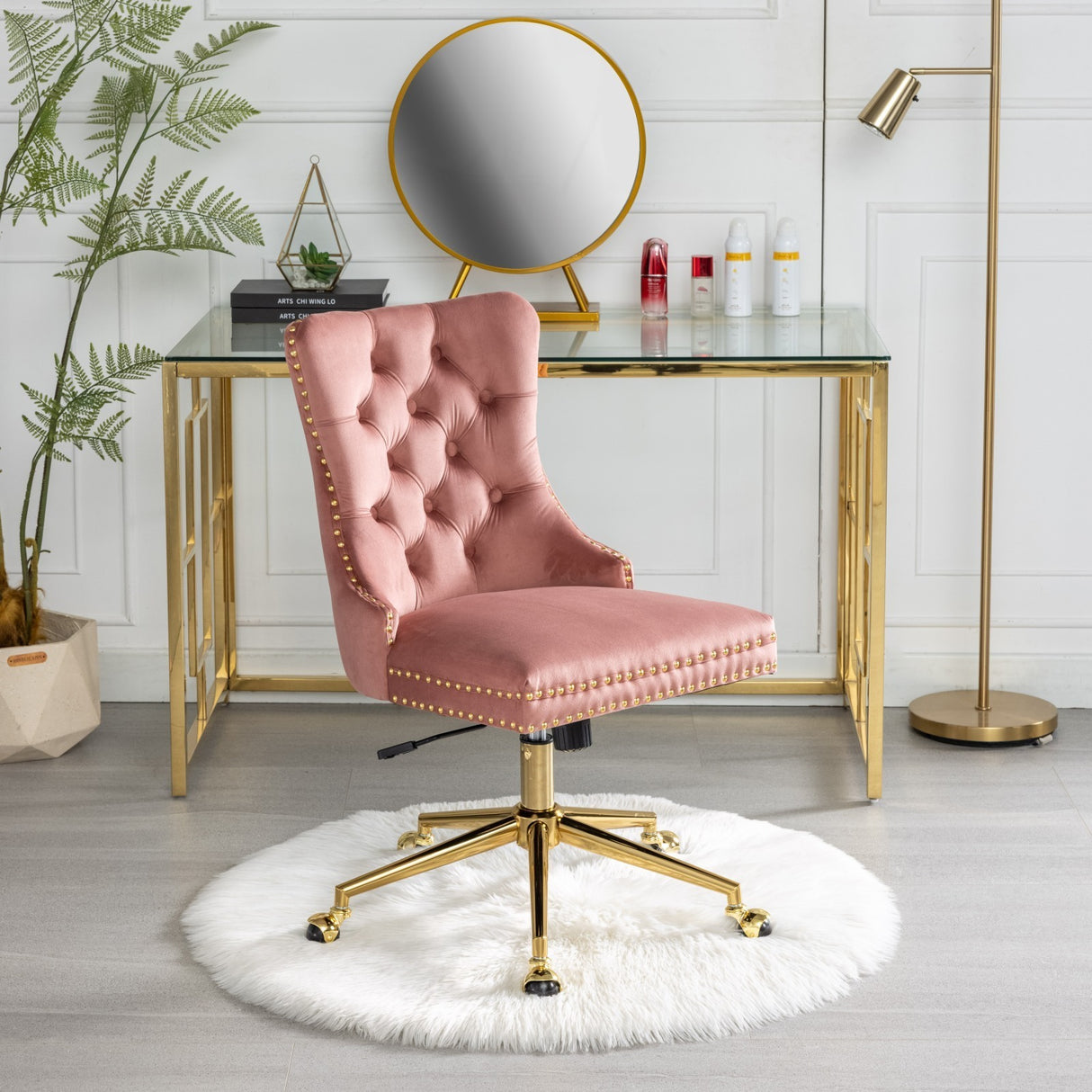 Velvet upholstered tufted chair with golden metal adjustable swivel base