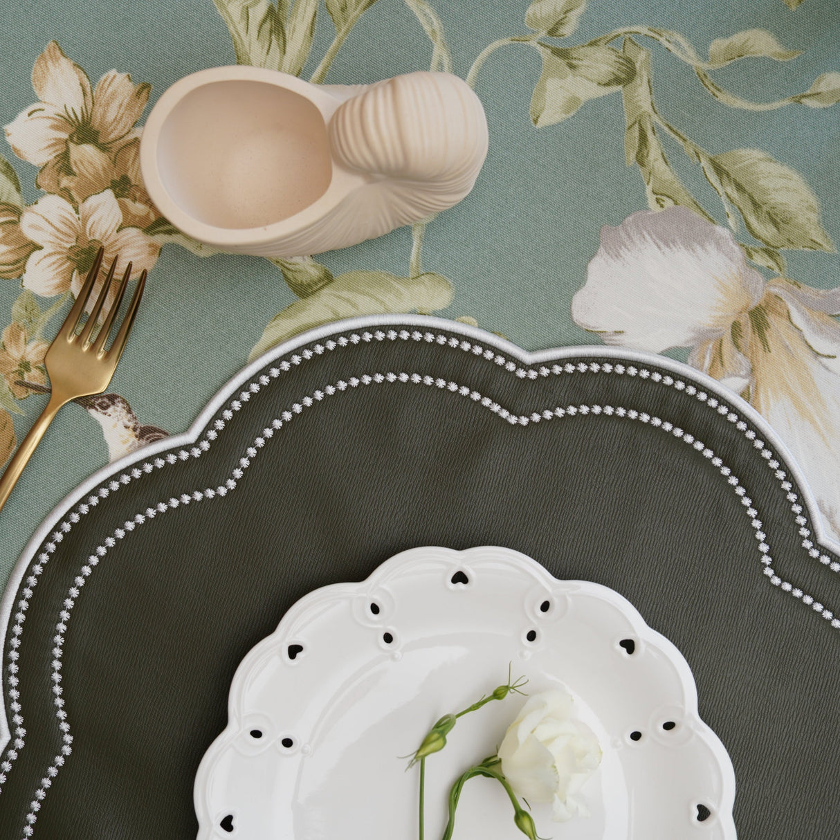 NURTURE GREEN SCALLOPED FAUX LEATHER PLACEMAT