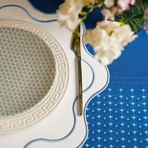 Haven White Wavy Edge Blue Trim Faux Leather Placemats