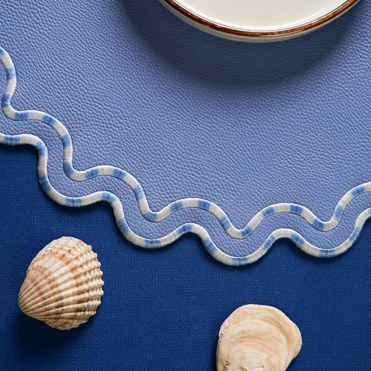 ELYSIAN LIGHT BLUE ROUND FAUX LEATHER PLACEMAT