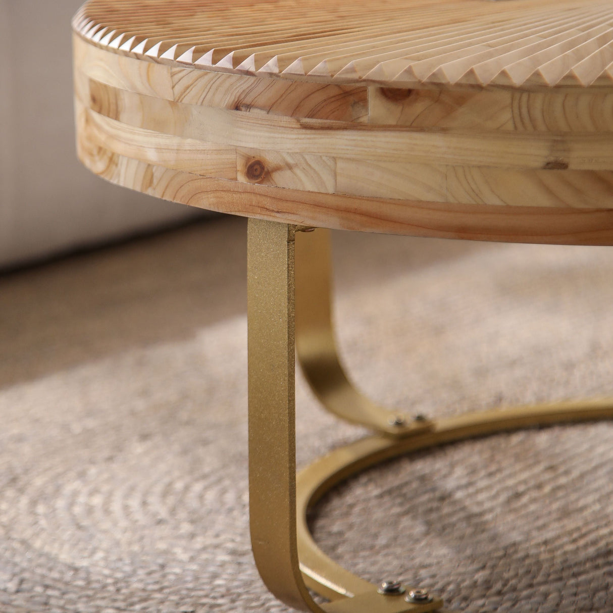 Modern Round Coffee Table with Wooden Carving Pattern and Metal Legs in Golden Natural Finish, Pine and MDF Construction