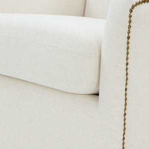 Cream Swivel Accent Chair with Antique Brass Nailhead Trim