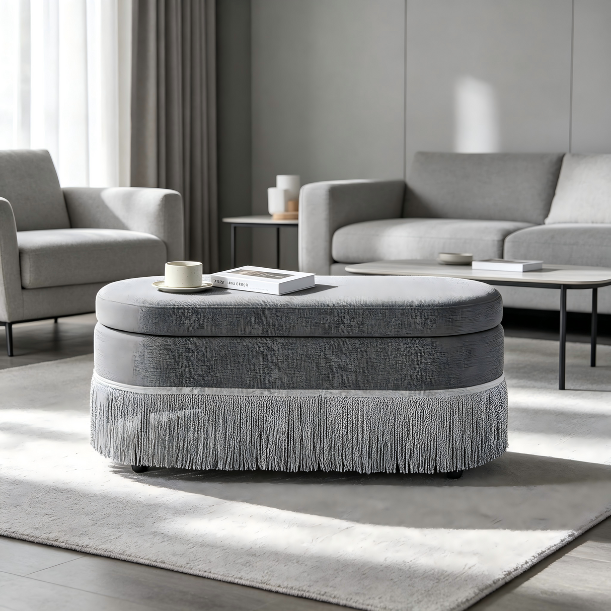 Oval Upholstered Storage Ottoman with Fringe Trim