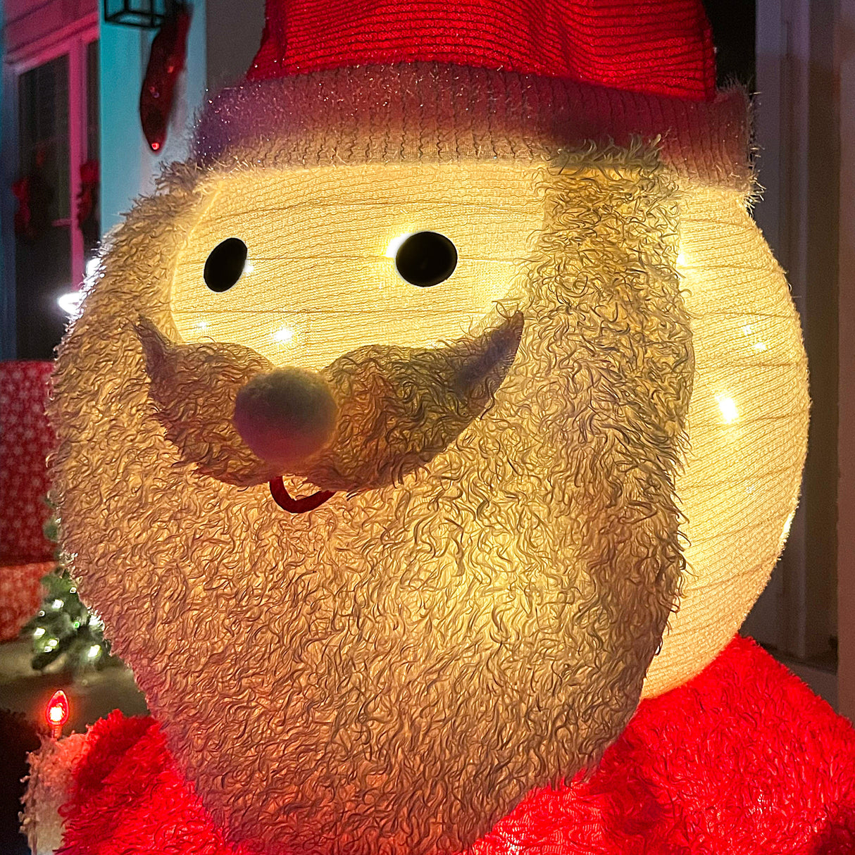 4-Ft. Prelit Collapsible Tinsel Santa Indoor or Outdoor Decoration