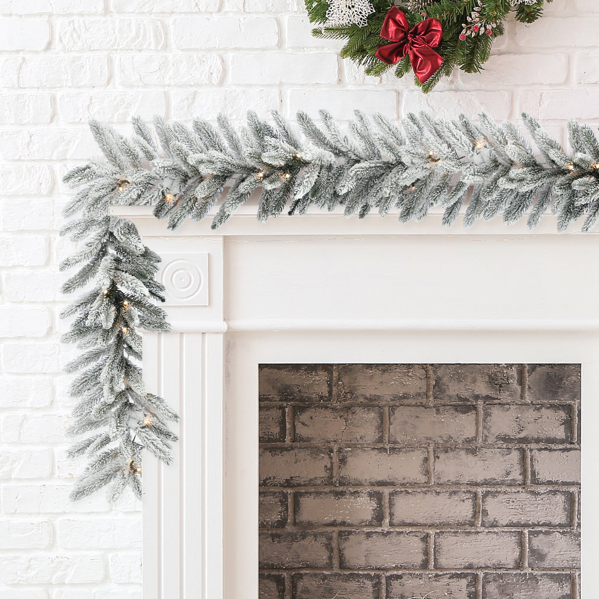 9-Ft. Icy Frost Snow Flocked Garland with Warm White LED Lights