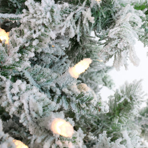 Fraser Hill Farm 9-Ft Flocked Mountain Pine Artificial Christmas Tree with Warm White LED Lights