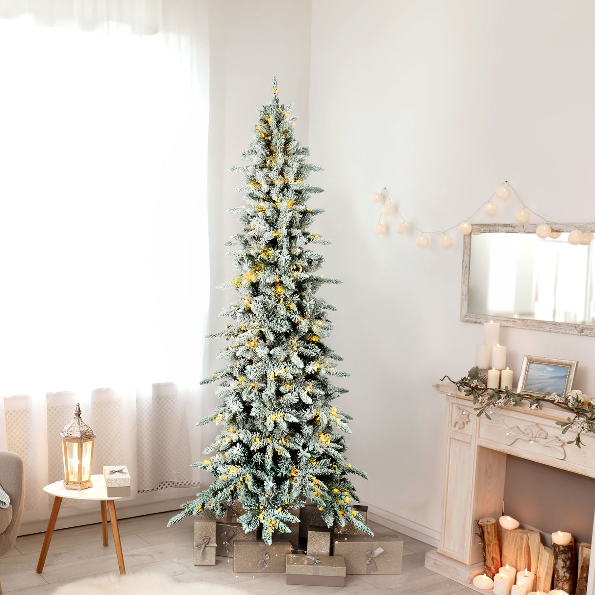 Fraser Hill Farm 9-Ft Slim Mountain Pine Flocked Artificial Christmas Tree with Warm White LED Lights