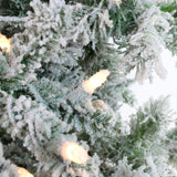 Fraser Hill Farm 9-Ft Slim Mountain Pine Flocked Artificial Christmas Tree with Warm White LED Lights