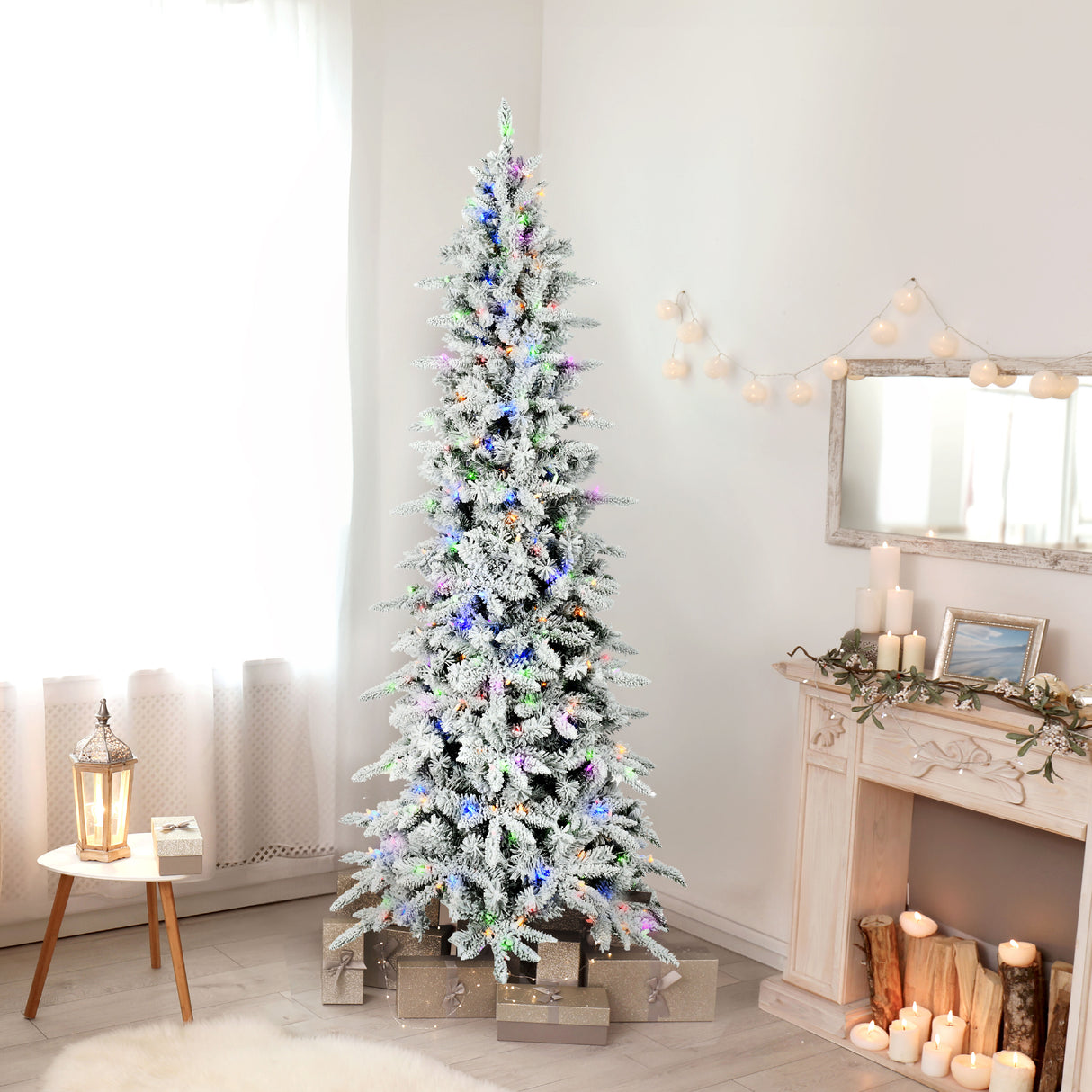 Fraser Hill Farm 9-Ft Slim Mountain Pine Flocked Christmas Tree with Dual Multicolor & White LED Lights