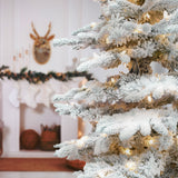 10-Ft. Flocked Pine Valley Christmas Tree with Warm White LED Lights