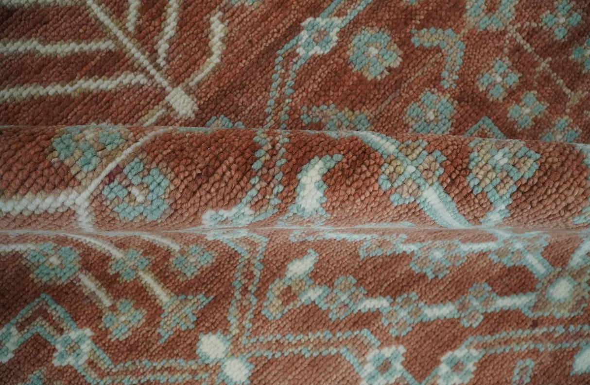 Hand knotted 8x10 Rust and Aqua Floral wool Area Rug