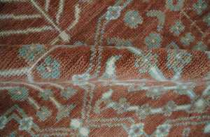 Hand knotted 8x10 Rust and Aqua Floral wool Area Rug
