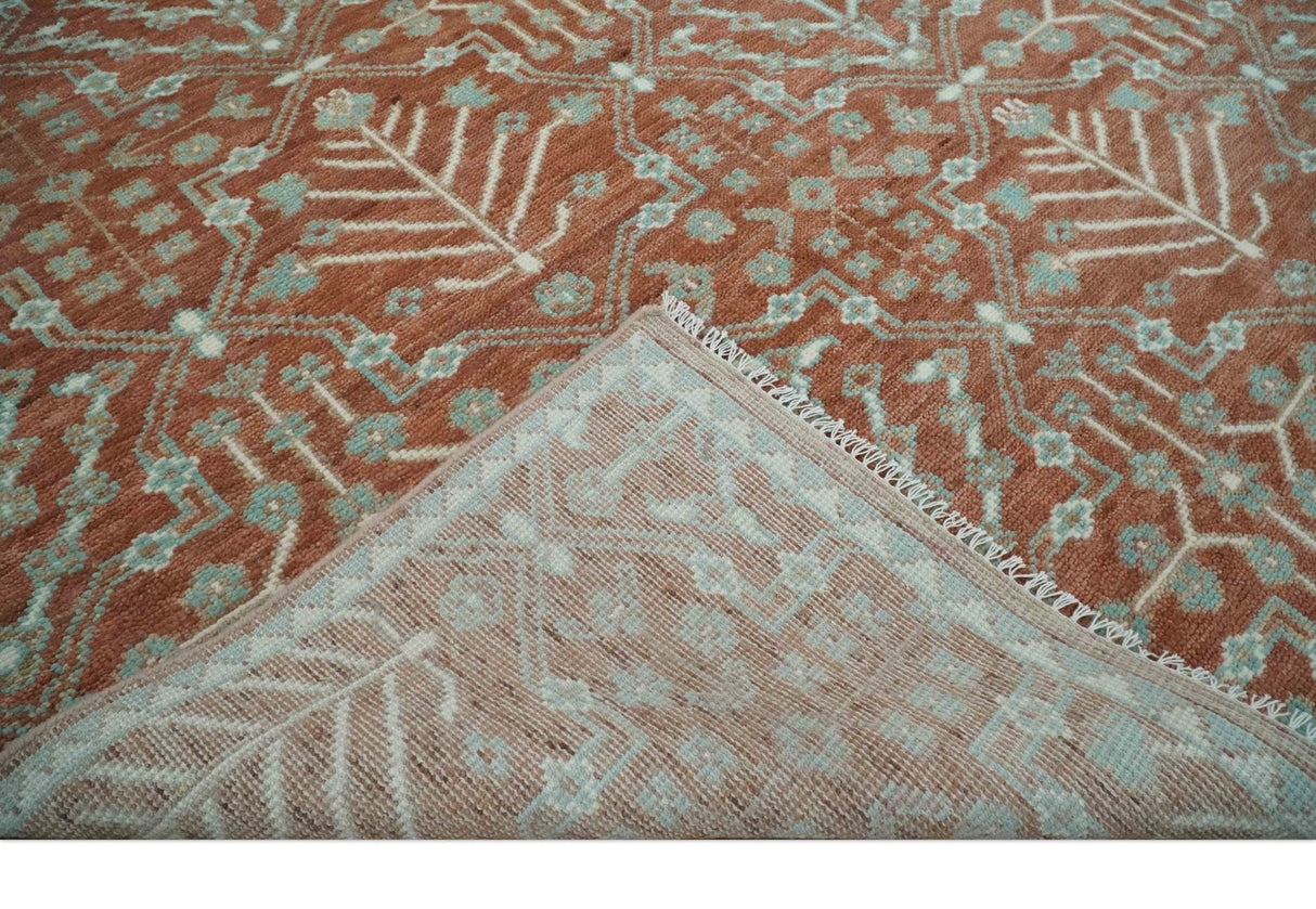 Hand knotted 8x10 Rust and Aqua Floral wool Area Rug