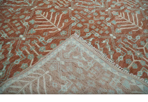 Hand knotted 8x10 Rust and Aqua Floral wool Area Rug