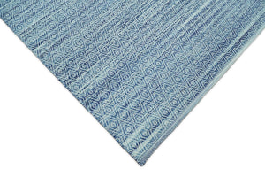 Handmade Boho Ivory and Blue Wool Blend Dhurrie Rug
