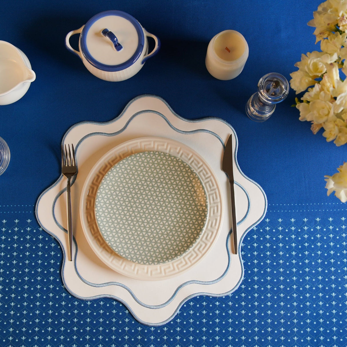Haven White Wavy Edge Blue Trim Faux Leather Placemats