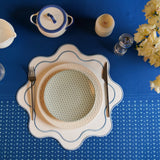 Haven White Wavy Edge Blue Trim Faux Leather Placemats