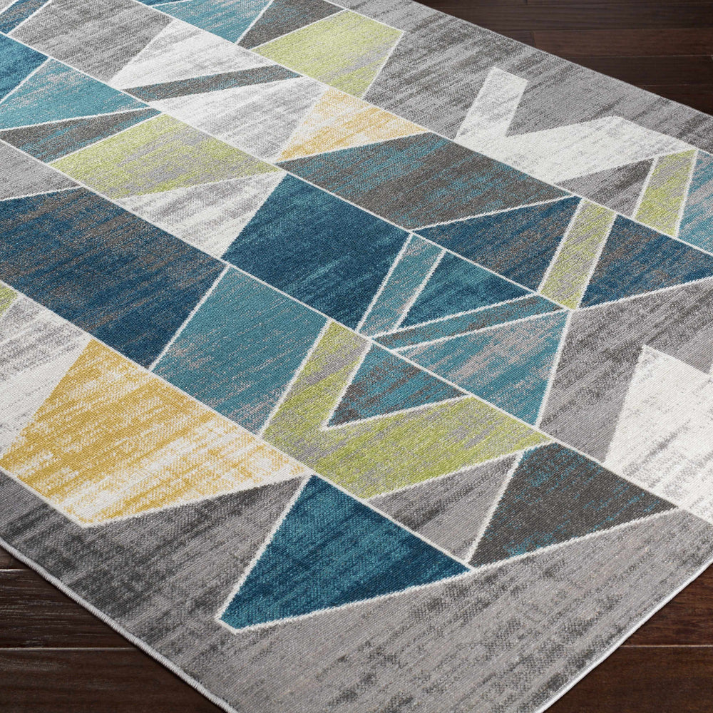 Hessel Green Triangles Area Rug