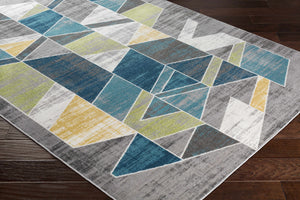 Hessel Green Triangles Area Rug