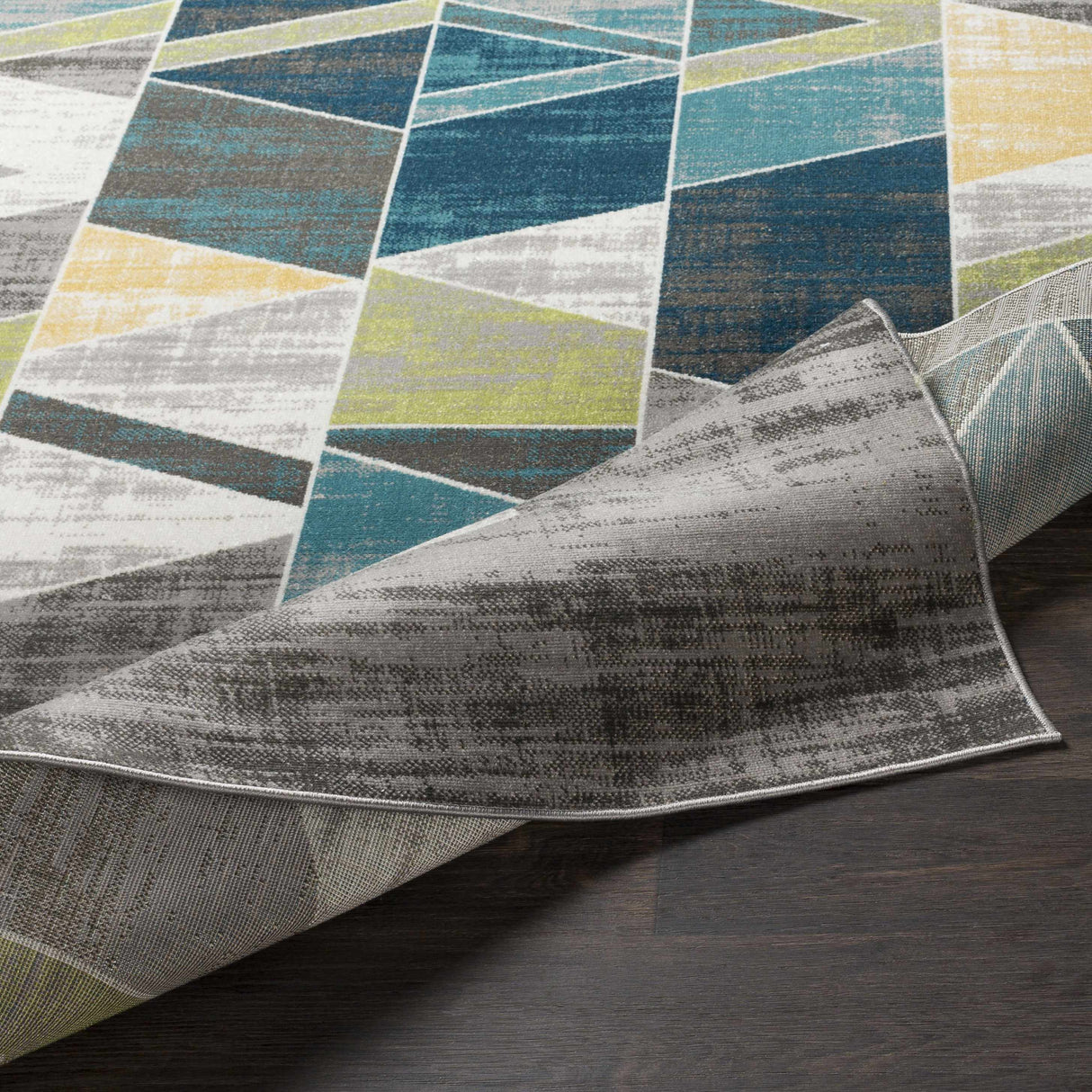Hessel Green Triangles Area Rug