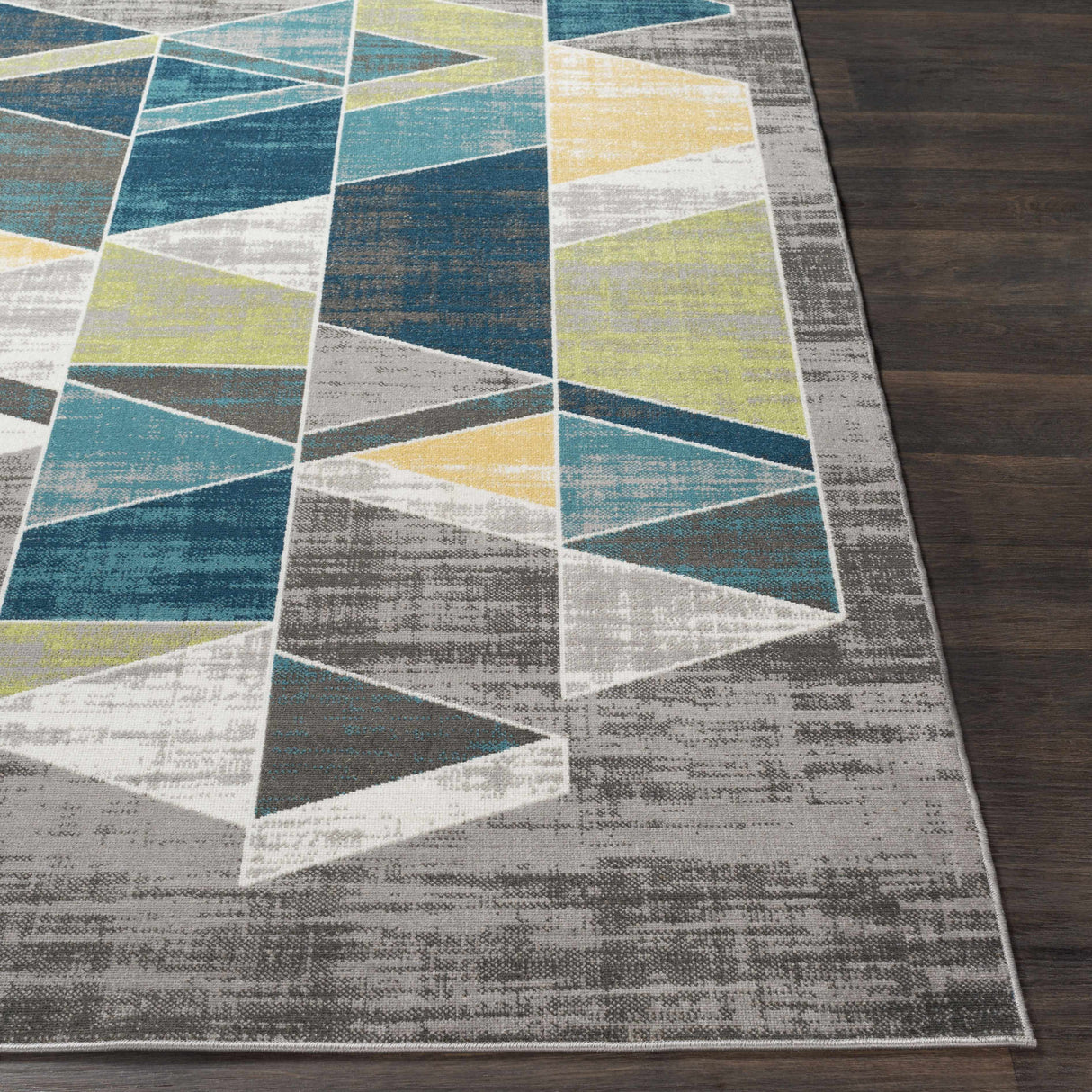 Hessel Green Triangles Area Rug