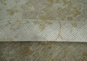 Ivory and Brown distressed finished Traditional Floral Low Pile Multi Size wool Area Rug