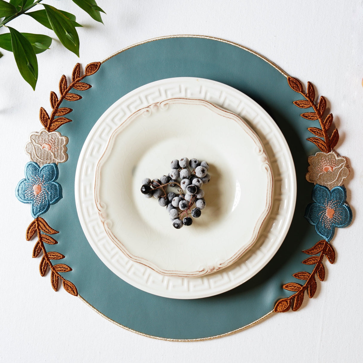 Jasmine Blue Round Faux Leather Placemats