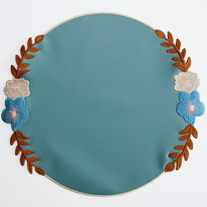 Jasmine Blue Round Faux Leather Placemats