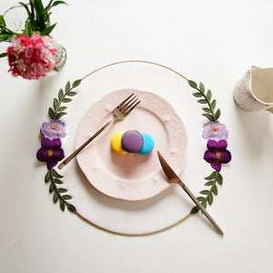 Jasmine White Round Faux Leather Placemat