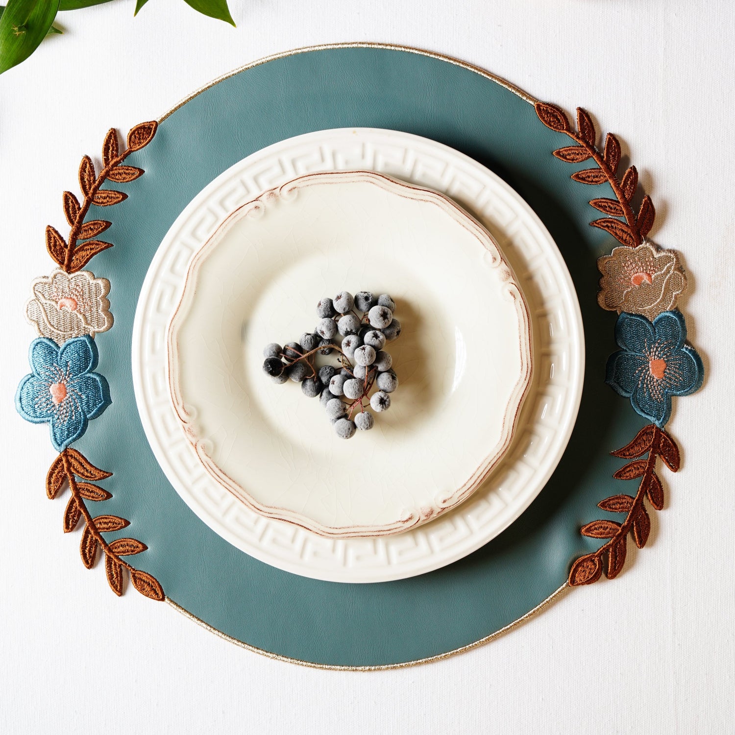 Jasmine Blue Round Faux Leather Placemats