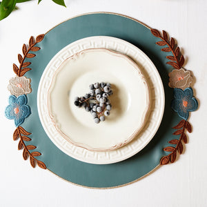 Jasmine Blue Round Faux Leather Placemats