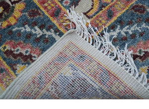 Kelly Turkish Design Ivory And Blue Hand Knotted Wool Rug