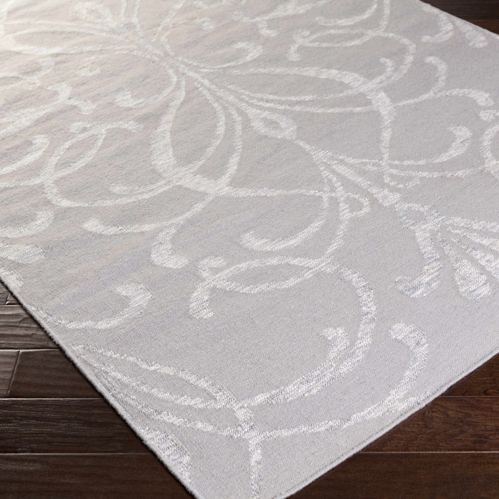 Lejunior Area Rug - Clearance
