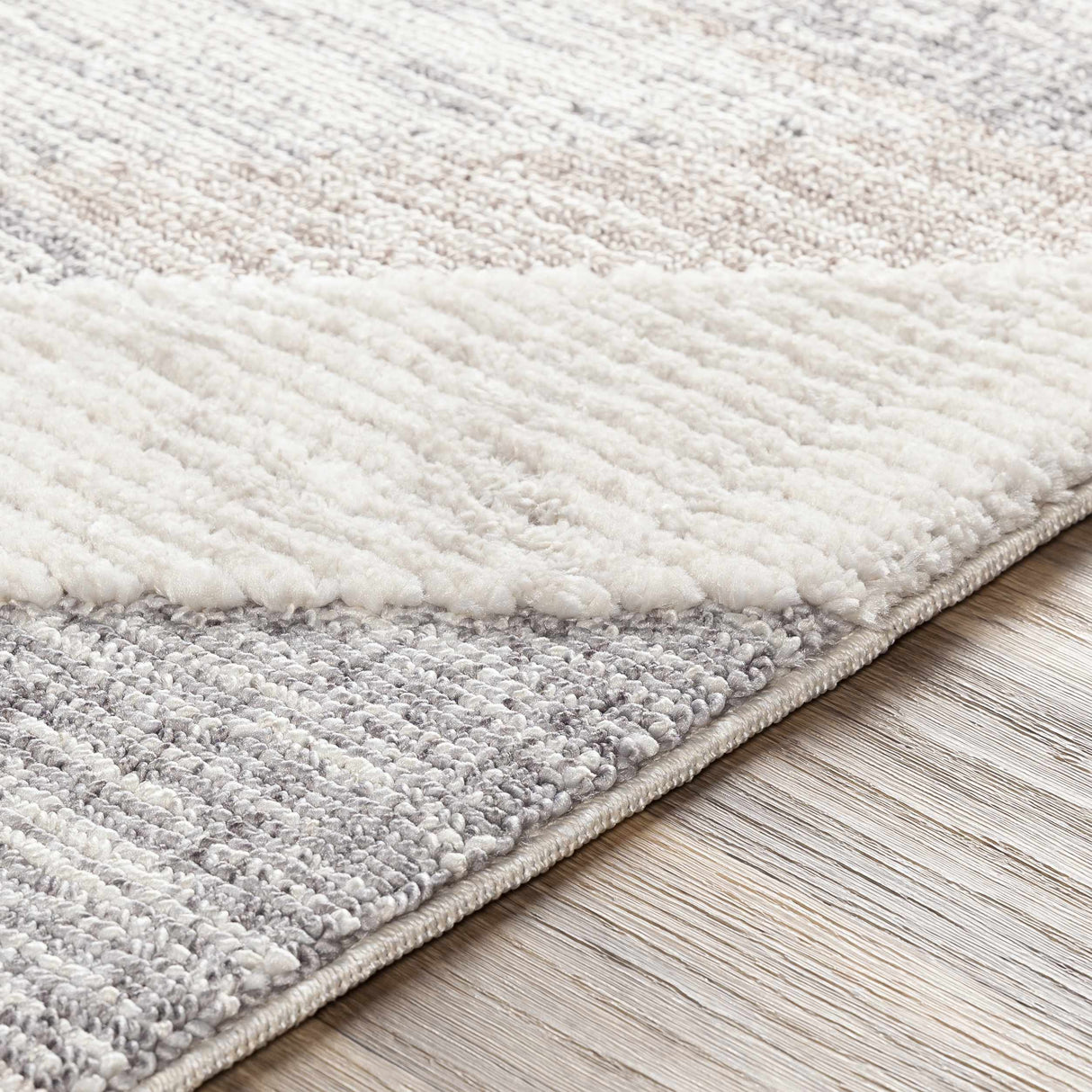 Magazine Geometric High/Low Pile Rug with Tassels - Clearance