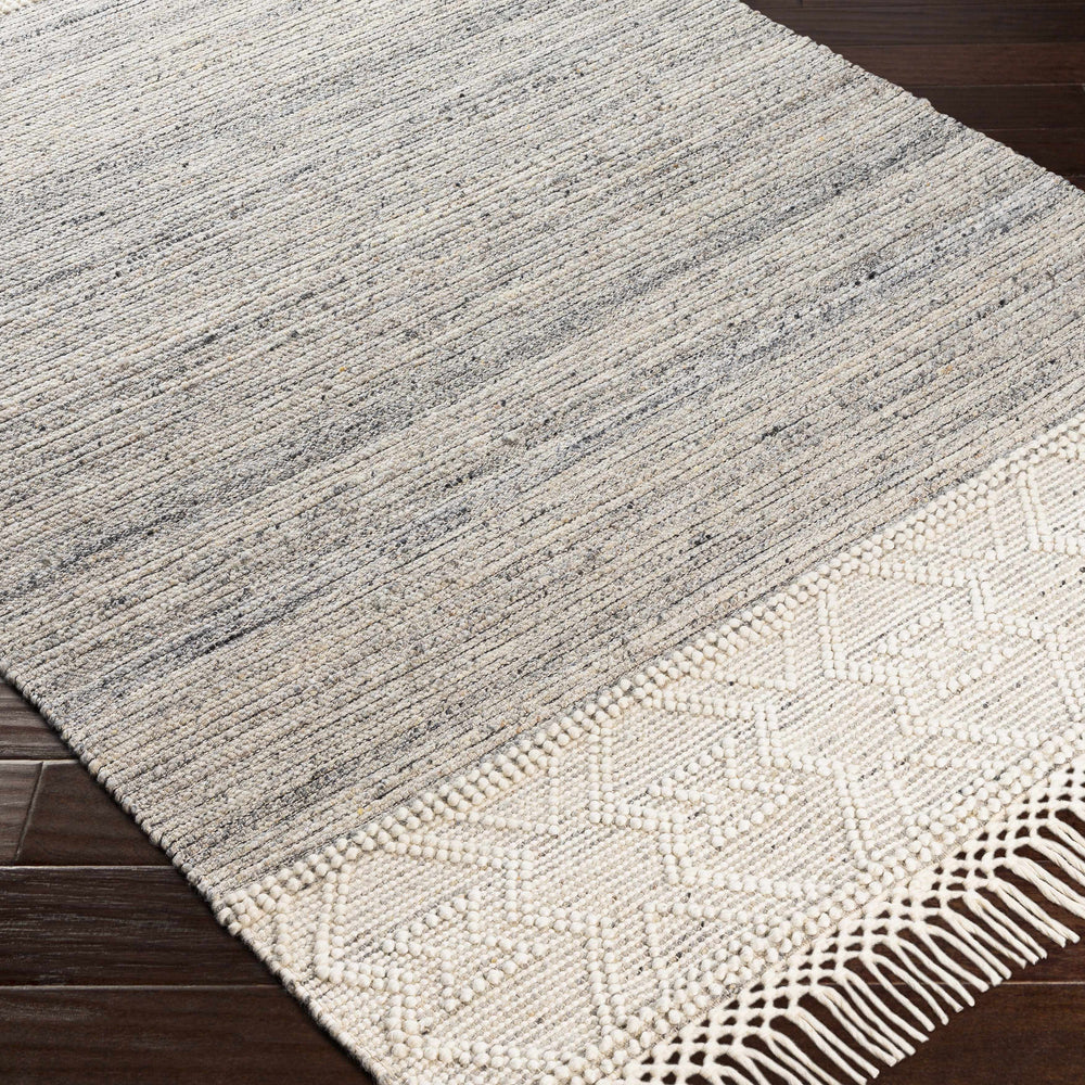 Cream Magnaga Wool Blend Braided Tassel Area Rug - Clearance