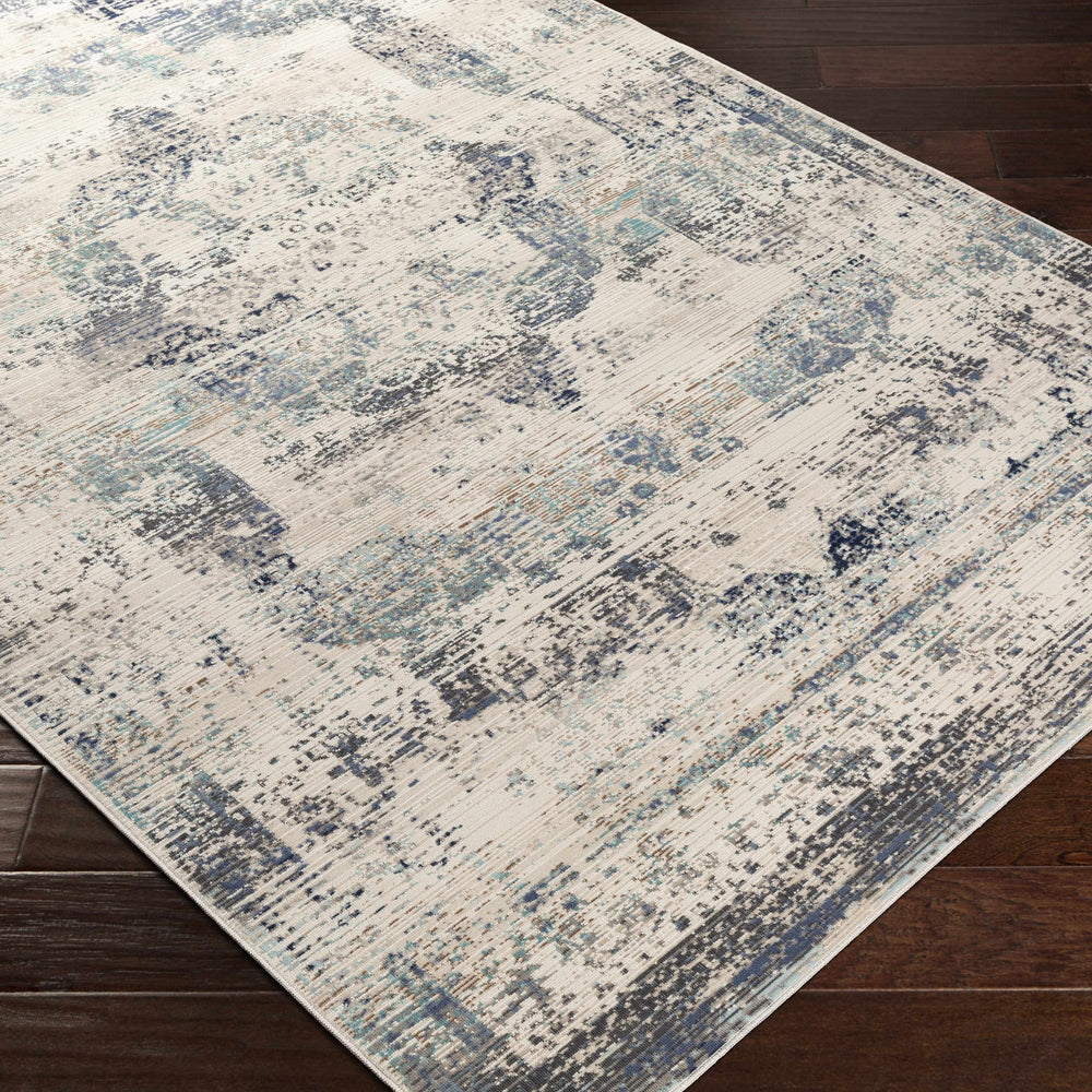 Needingworth Area Rug - Clearance