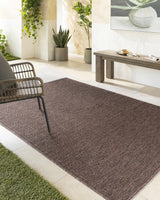 Nuela Dark Brown Area Rug - Clearance