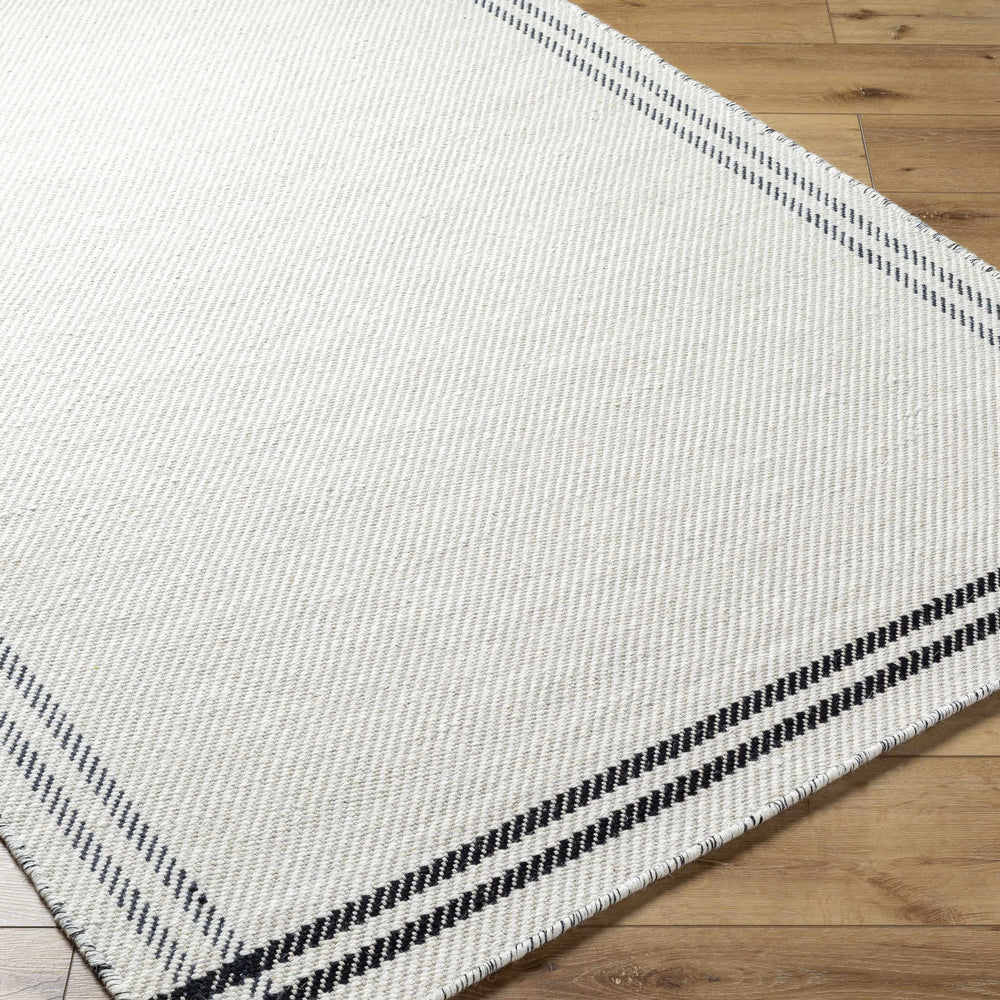 Nimue Cream & Blue Bordered Area Rug - Clearance